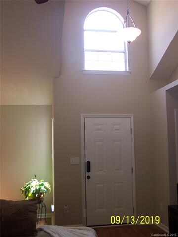 Soaring ceilings in the foyer and family room