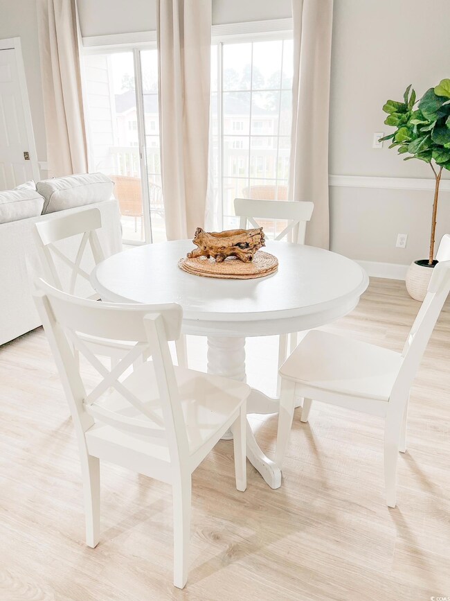 Dining room featuring wood-type flooring