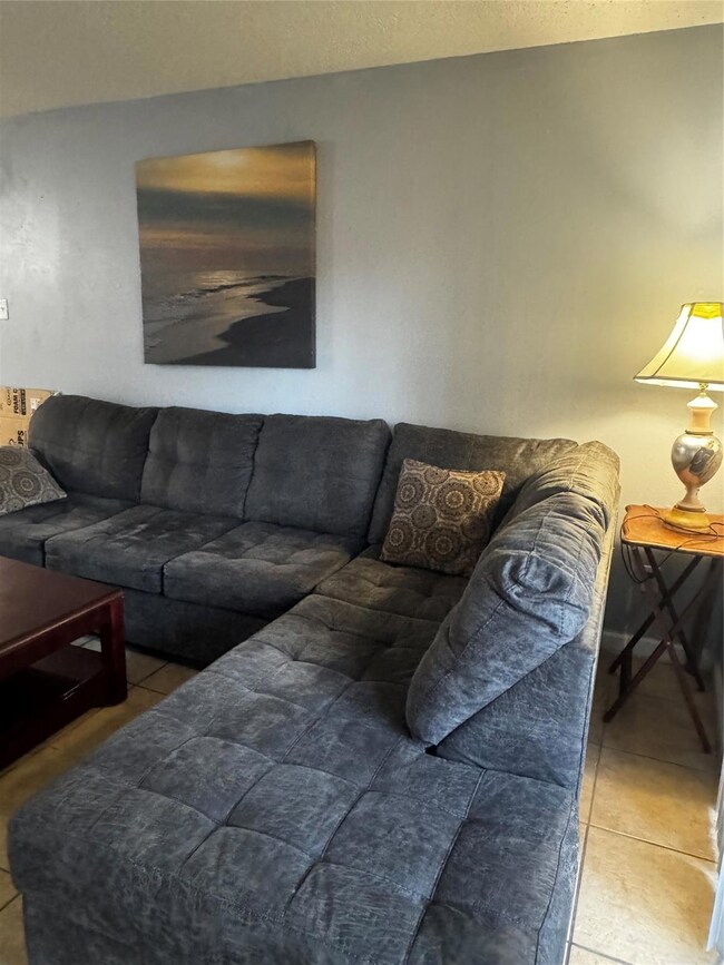 View of tiled living room