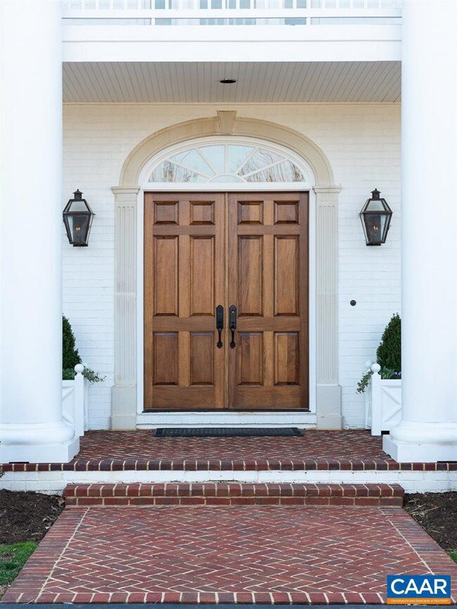 gas lanterns at the front door