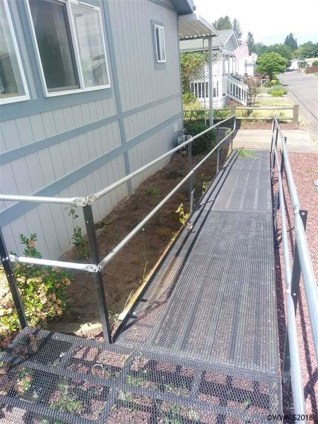 Ramp going to front of house.