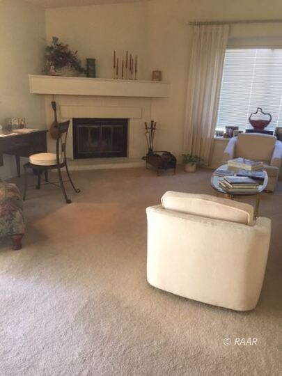spacious living room & fireplace