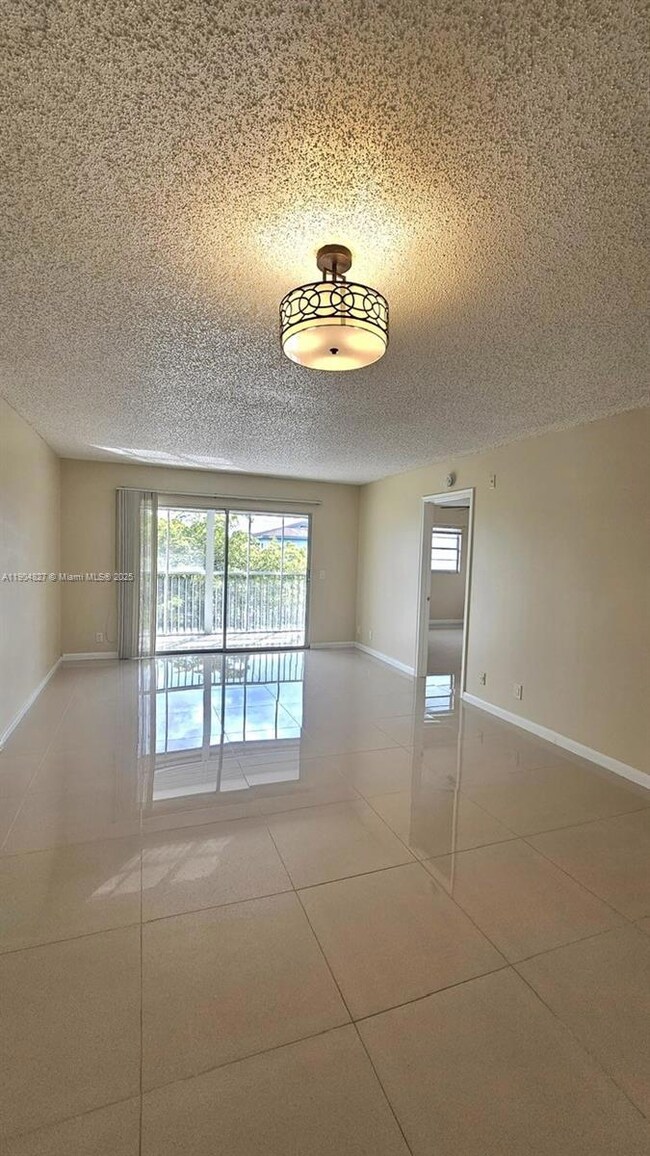 1401 SW 128th Terrace unit H410, Pembroke Pines, FL 33027 - photo 2