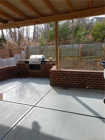 Covered patio with built in grill