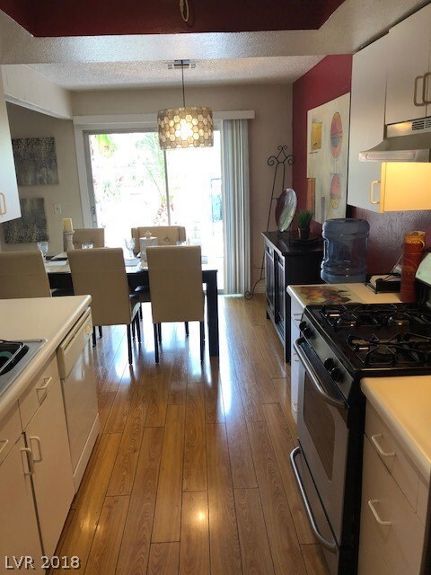 Kitchen has great stove and stainless steel refrig