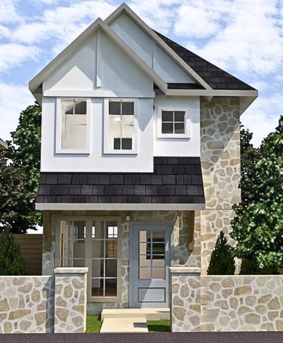 View of front of property featuring stone siding 