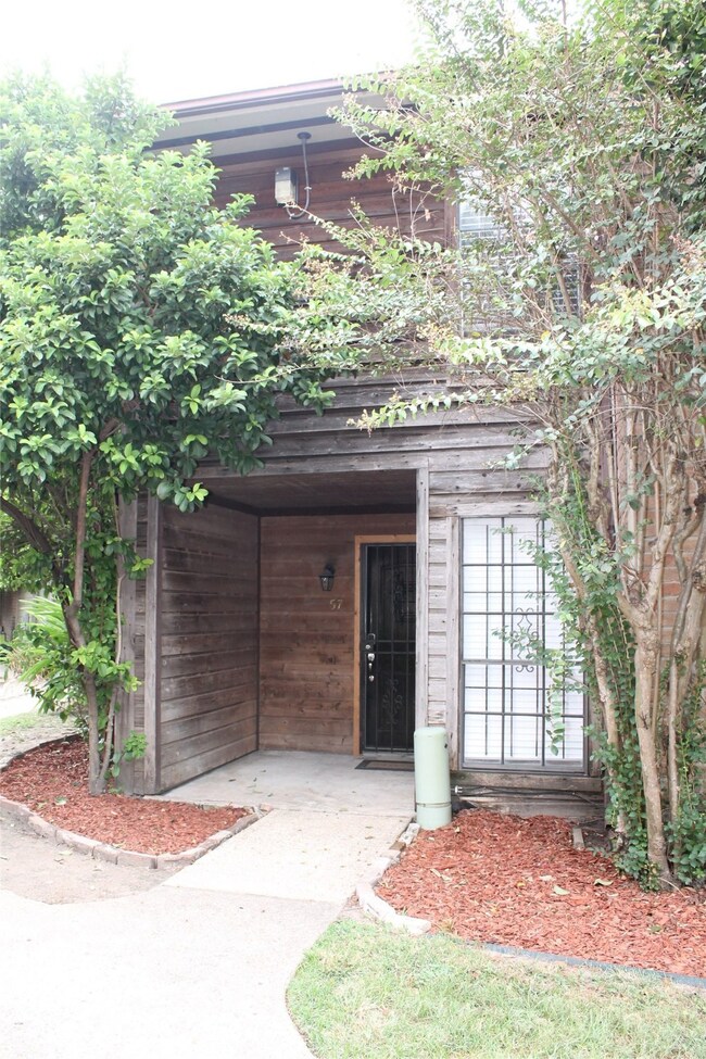 Covered front porch is perfect for a cup of coffee