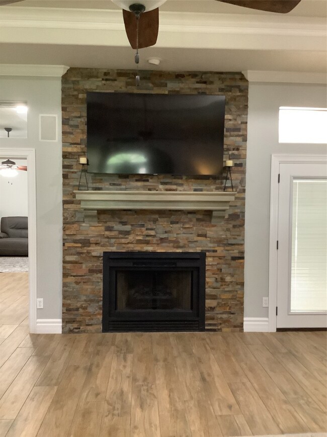 Cozy wood burning fireplace.