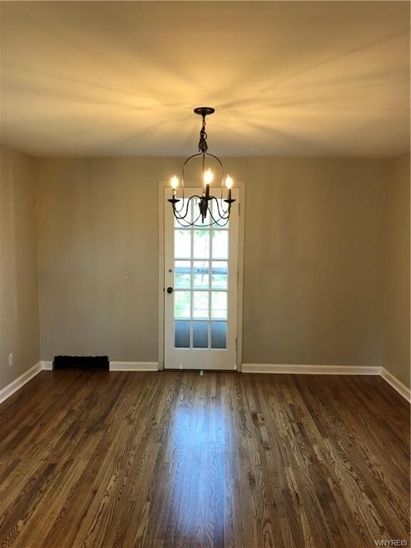 Dinning room with back door leading to patio