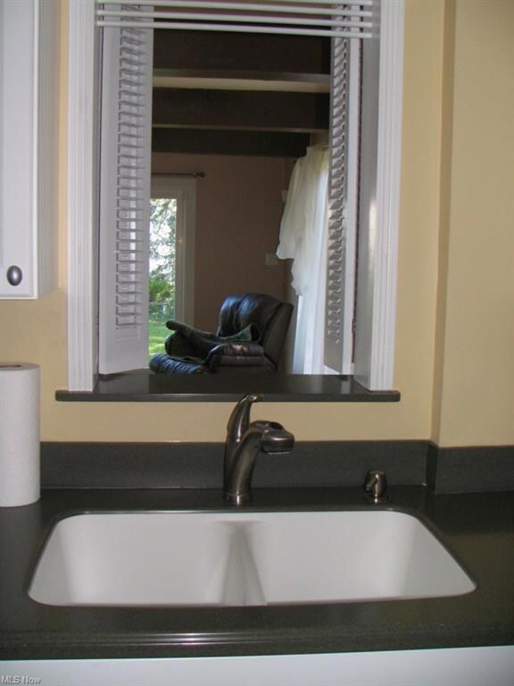 Kitchen - Newer sink, faucet, & disposal.Pass thro
