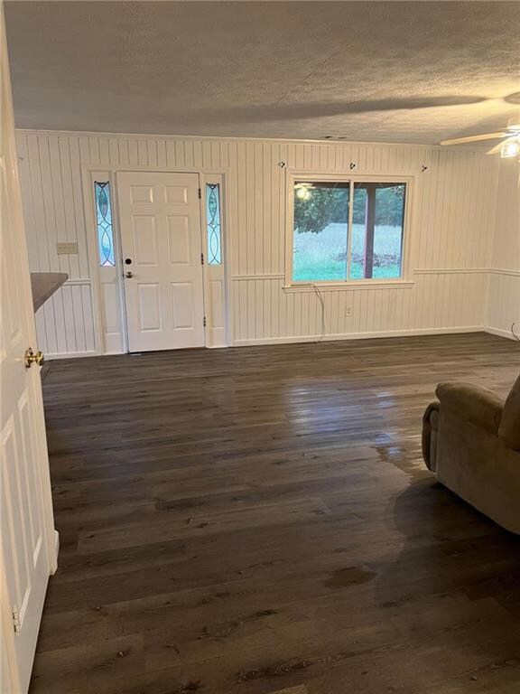 Foyer featuring dark hardwood / wood-style floorin