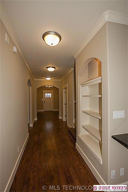 View of entry and beautiful Hardwood floors.