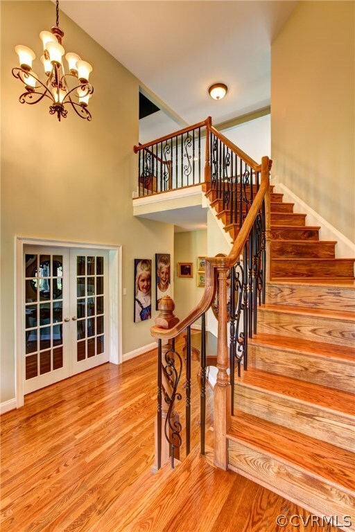 Two-story Foyer with French doors to 1st floor Off