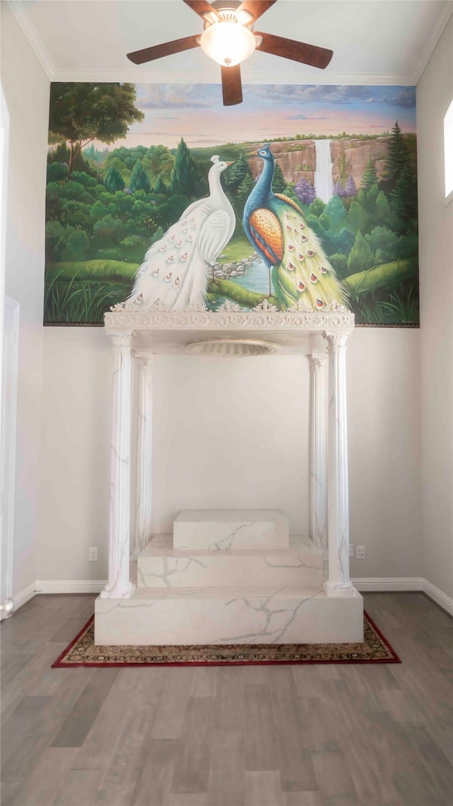 Peaceful meditation room with a custom peacock mur