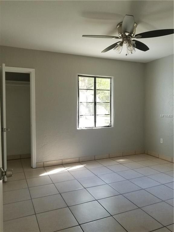 7706 New York Dr, Tampa, FL 33619 - photo 6