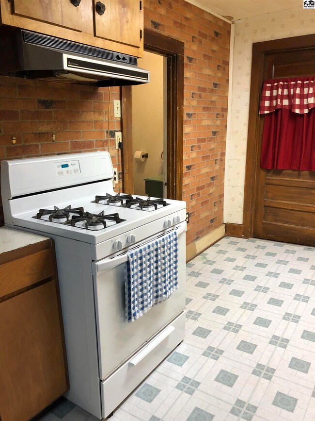 Gas range on this side of the kitchen. Access to t