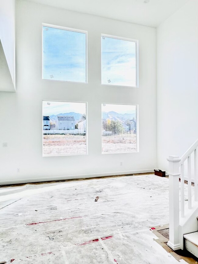 Empty room featuring stairs