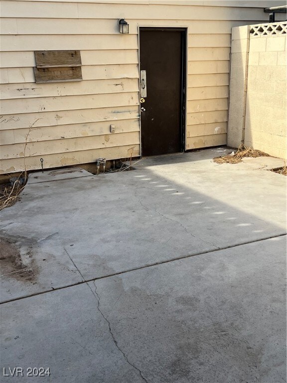 View of exterior entry to garage