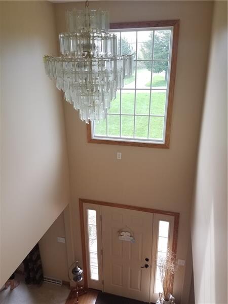 Beautiful chandelier in entryway.