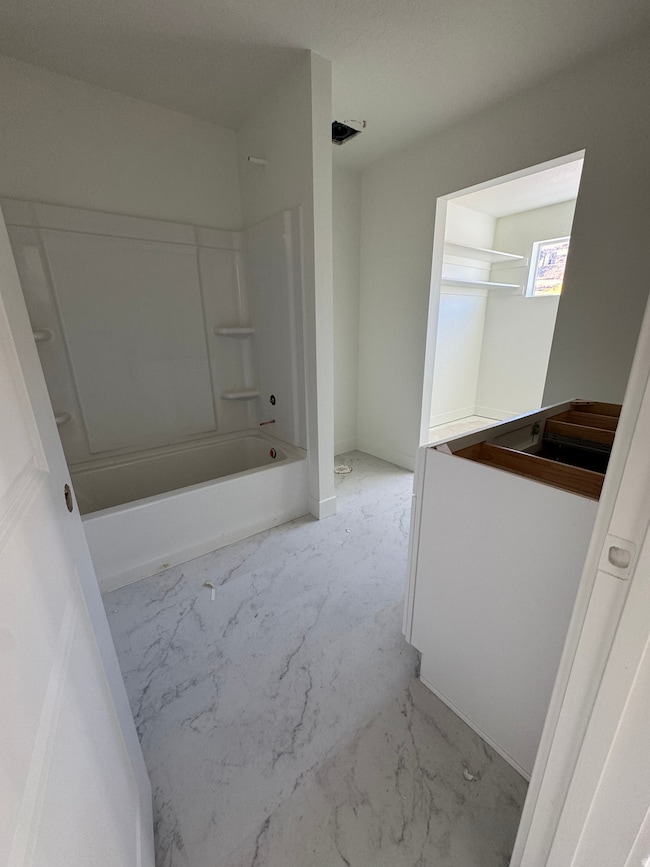 Full bath with  shower combination and vanity