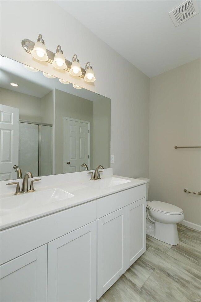 Master Bath with Raised Height Double Bowl Vanitie