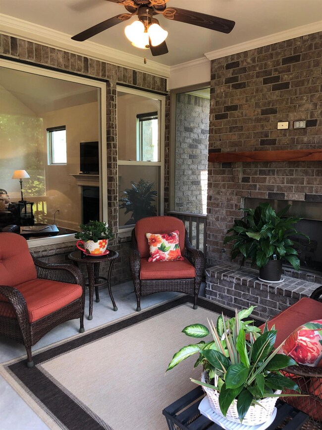 Another view of this beautiful enclosed porch.
