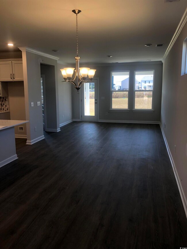 Interior space featuring crown molding, a notable 