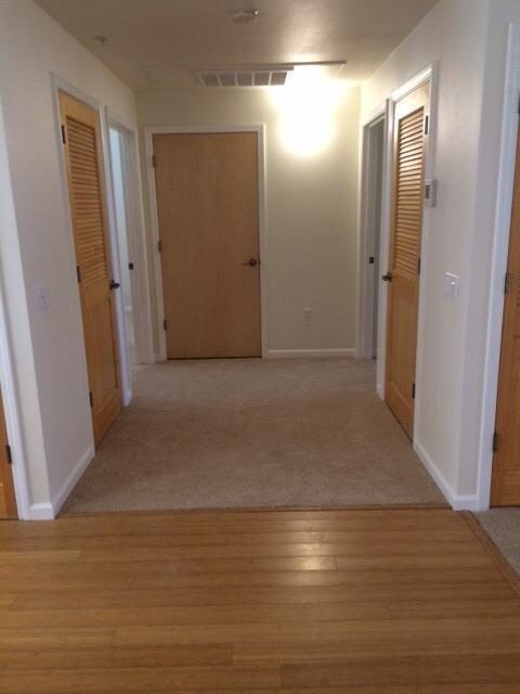 Hallway between bedrooms.