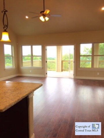 Living room: Vaulted ceiling with views from your covered outdoor living of Canyon Lake