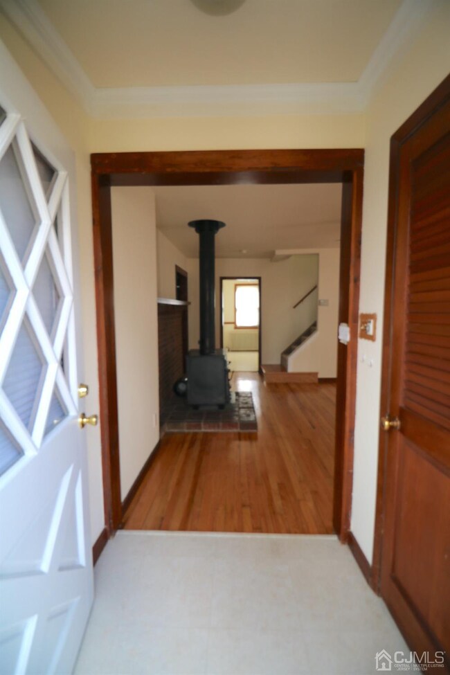 Entry Foyer flanked by 2 coat closets.
