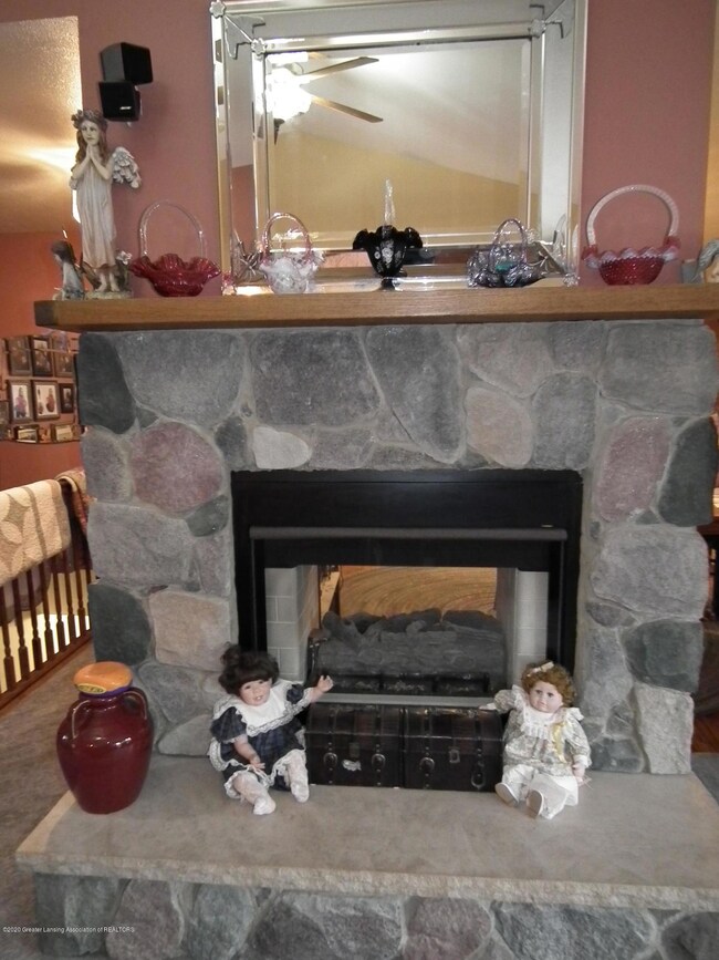 Two way fieldstone gas fireplace