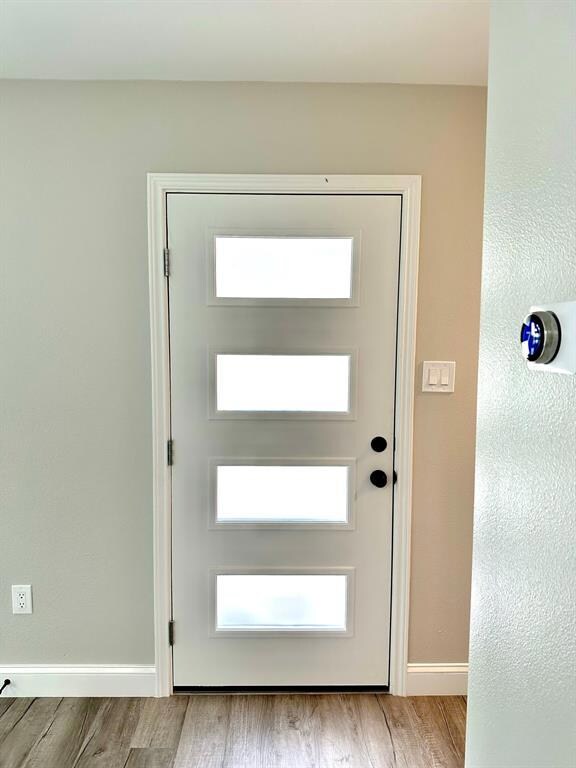 NEST Thermostat and interior of front door