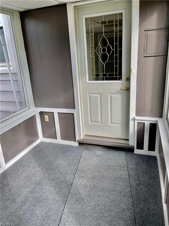 Breezeway from garage protecting one from our NEO elements.