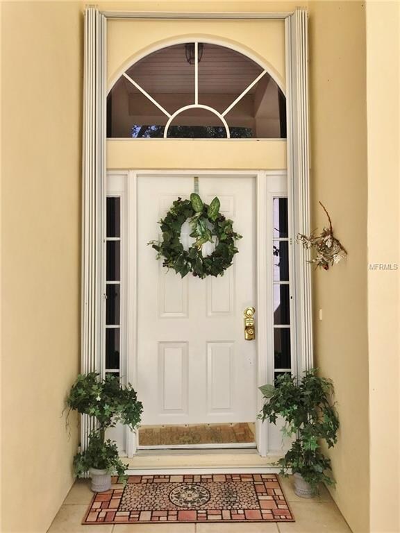 Front Entrance-Notice Accordian Hurricane Shutters