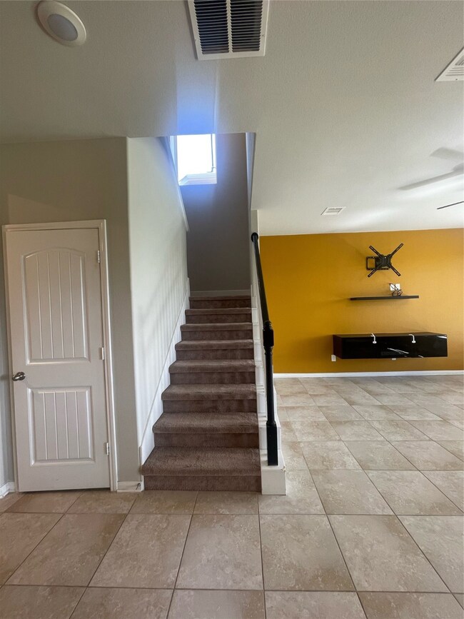 Staircase and family room area