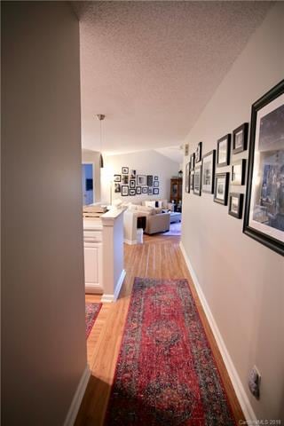 ENTRY HALL WITH LAMINATE WOOD FLOORS, FOYER CLOSET