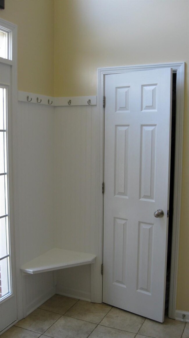 Hat Rack/Bench and Closet as you enter f