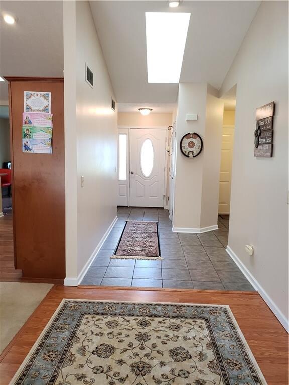 Entry way with plenty of natural light due to the 
