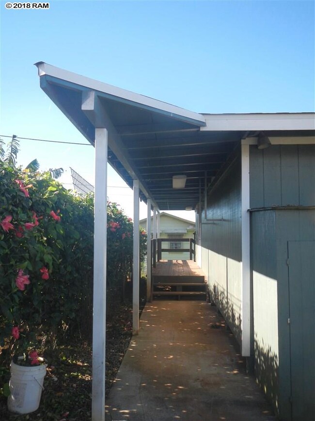 This covered lanai walkway leads to where the wash