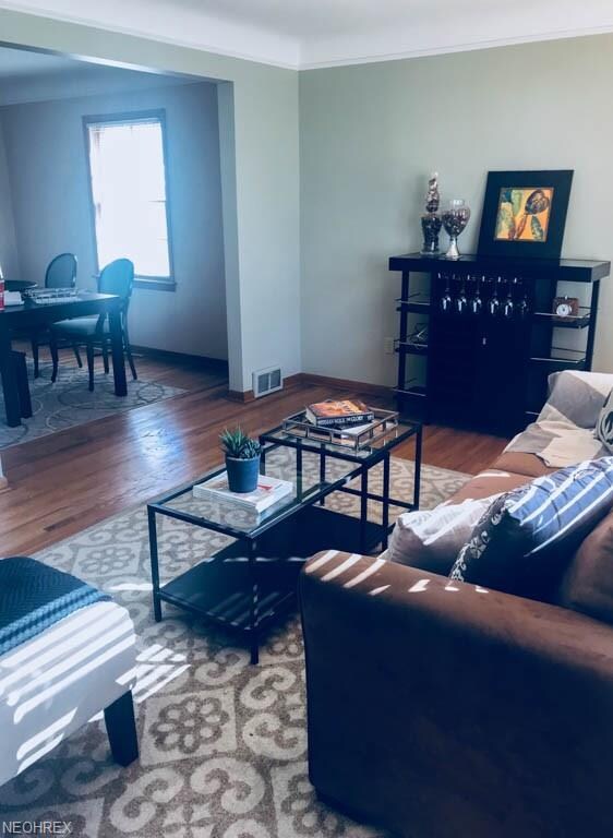 The living room looks into the dining room.