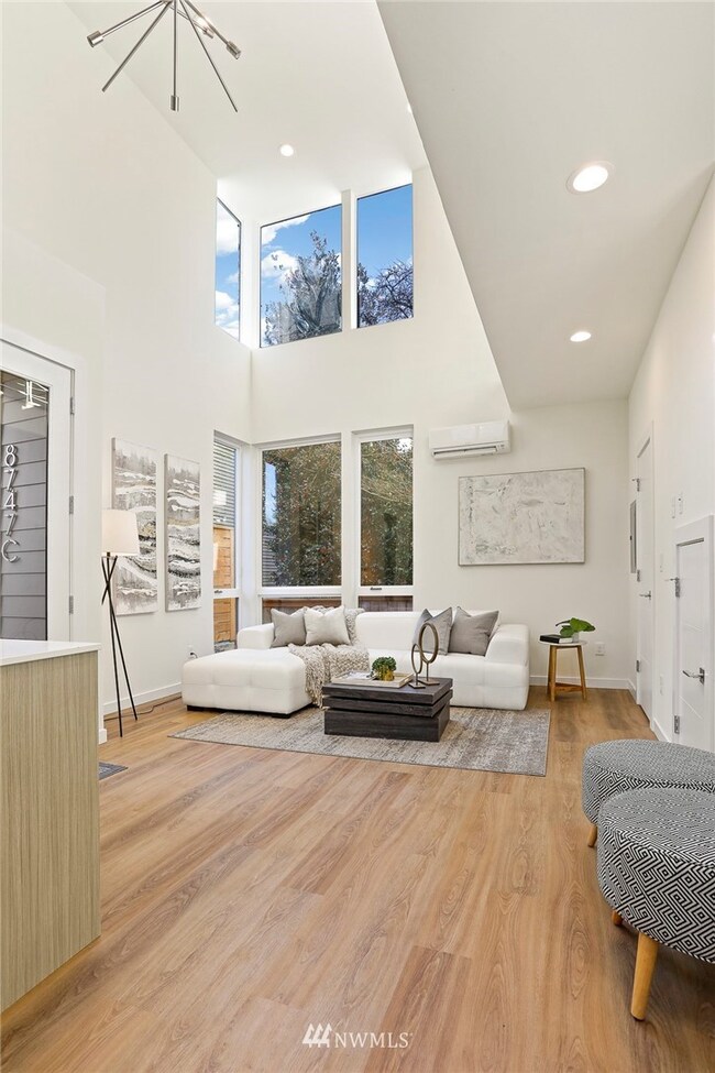 Dramatic Open Area to Upper Levels offers tons of Natural Light and Space