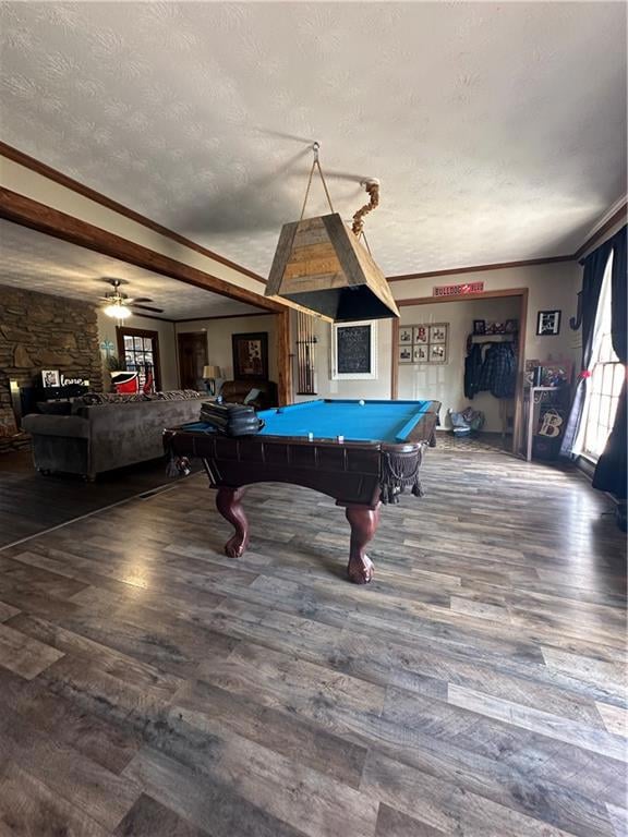 Playroom featuring a textured ceiling, ceiling fan