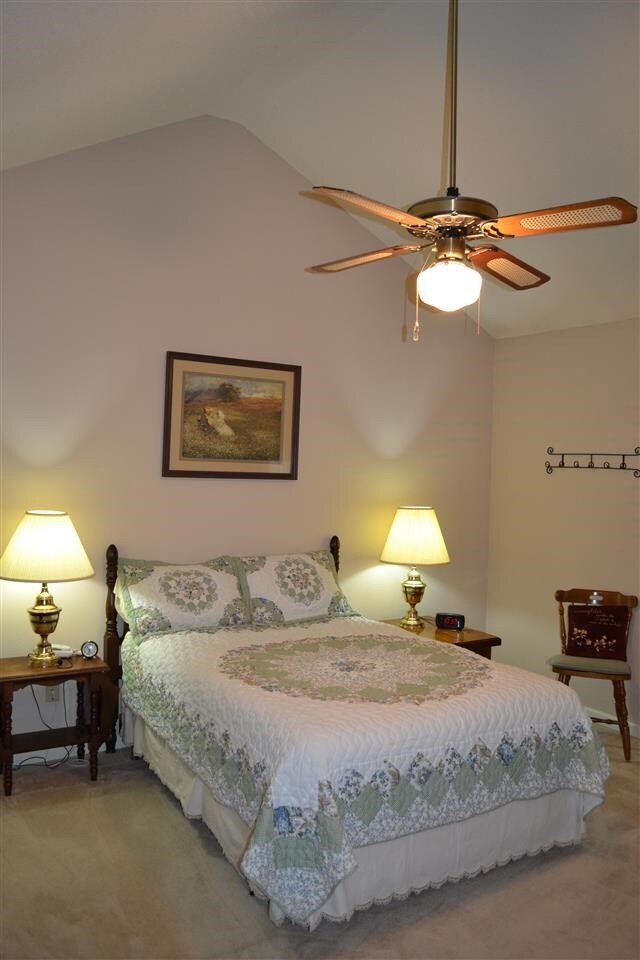 This view of the master bedroom shows the high cat