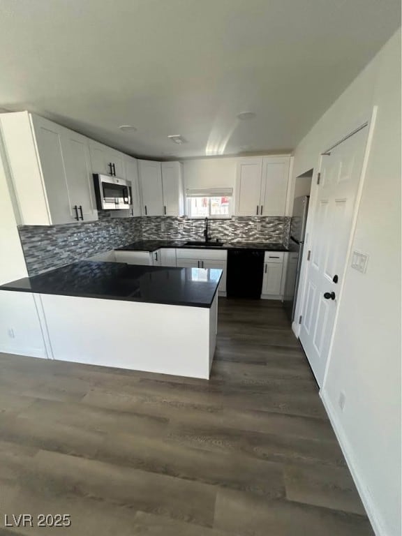 Kitchen with appliances with stainless steel finis