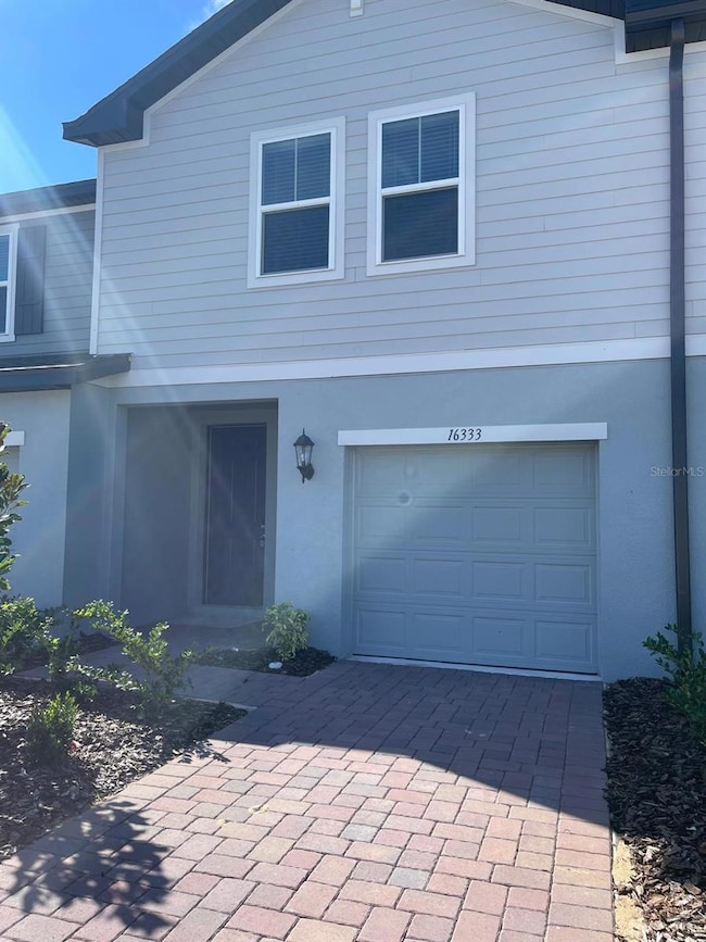 16333 Bird of Paradise Ave, Clermont, FL 34714 - photo 2