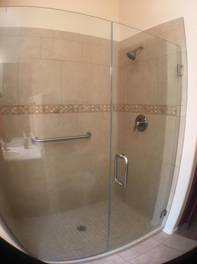 upgraded master tiled shower