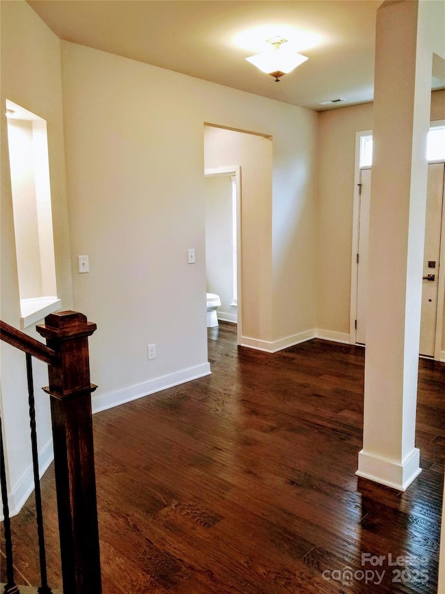 Foyer with half bath to the left