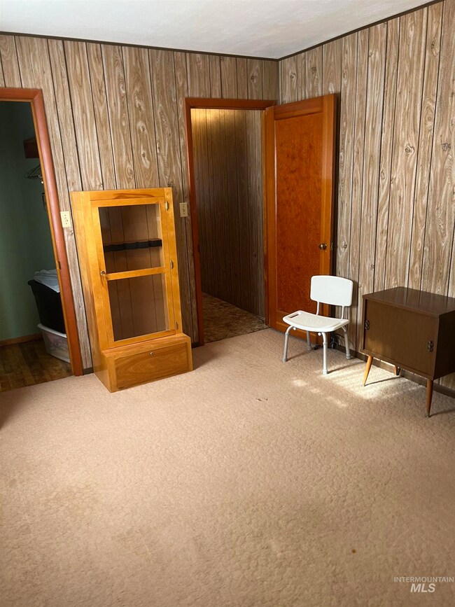 Interior space featuring wood walls