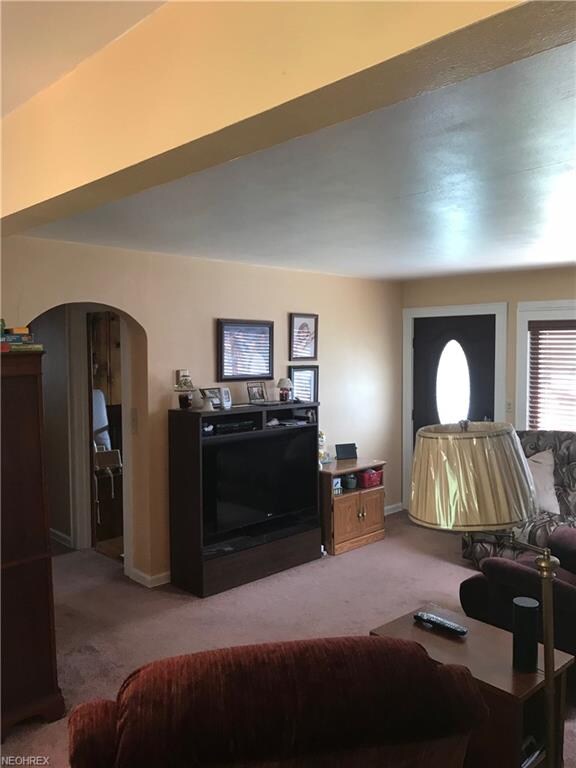 The bedrooms are down the hall from the living are