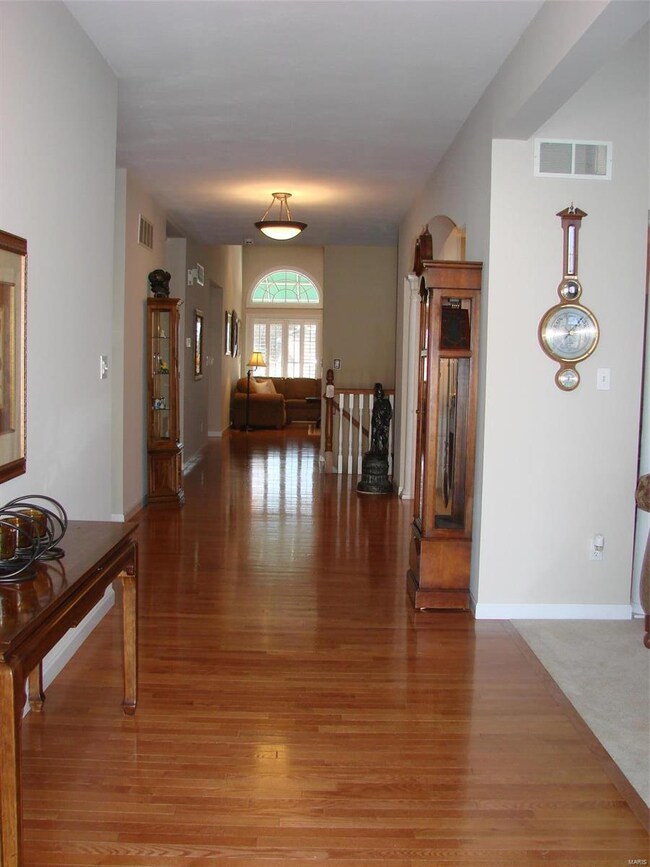 Lovely entry way into this elegant villa with glea